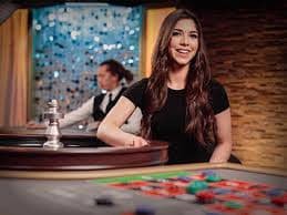 Exciting neon-lit casino environment with players enjoying games
